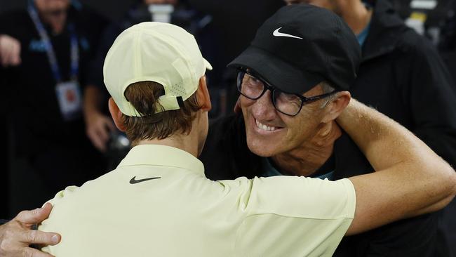 Jannik Sinner hugs coach Darren Cahill after winning the men’s singles title at the 2025 Australian Open. Picture: Michael Klein