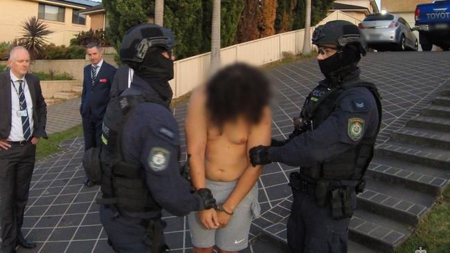 Khaled was arrested at his home in Blair Athol on Wednesday morning after almost 10 months of investigations by Strike Force Claypinch and Taskforce Erebus officers. Picture: NSW Police