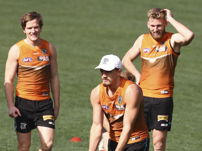 Port Adelaide Training at Adelaide Oval. Sam Powell-Pepper being watched by Jared Polec and Jackson Trengove. Picture Sarah Reed