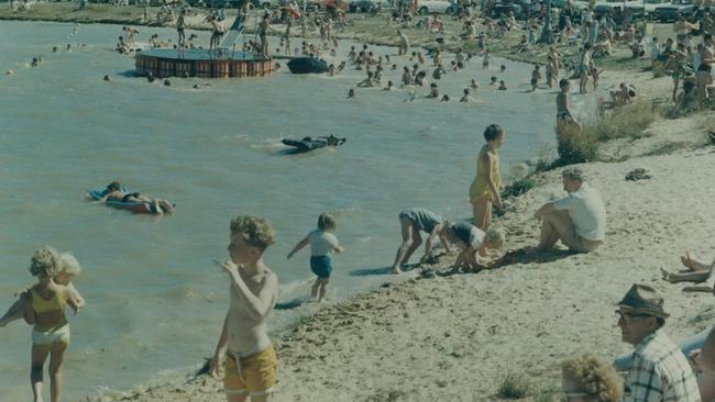 People enjoying the water activities at Caribbean Lake.