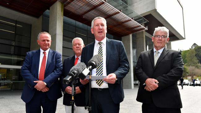 Joe, John, Dennis and Neill Wagner speak to the media outside the Supreme Court in Brisbane. Picture: AAP Image/Darren England