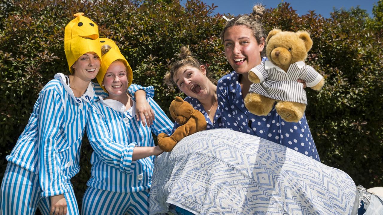 Banana's in Pyjamas Mikayla Wust (left) and Halle Goodall with teddies Zoe Wallace and Audrey Herridge as St Ursula's College students prepare for their boat race during St Ursula's Week, Wednesday, October 20, 2021. Picture: Kevin Farmer