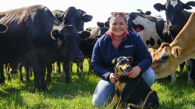 Dairy farmer Brooke Monk, from Kyabram, with her Kelpie Rose. Picture: Rachel Simmonds