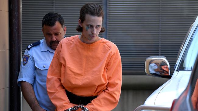 Blake Pender is escorted to a Corrective Services prison transport vehicle at the NSW Supreme Court in 2019. Picture: Dan Himbrechts