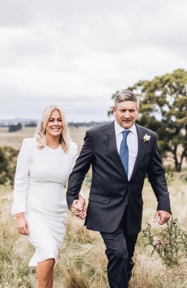 Armytage wore a white Carla Zampatti high-neck dress with a ribbon in her hair, while Lavender donned a grey suit, blue tie and white rose. Picture: Instagram