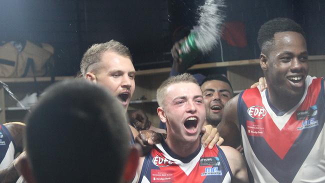 St Albans players celebrate their first win in the EDFL. Photo: Facebook.