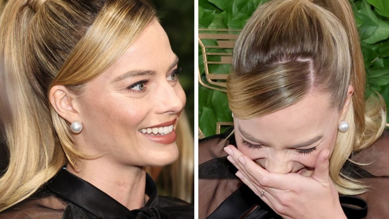 Cheeky red carpet act leaves Margot Robbie in a fit of giggles