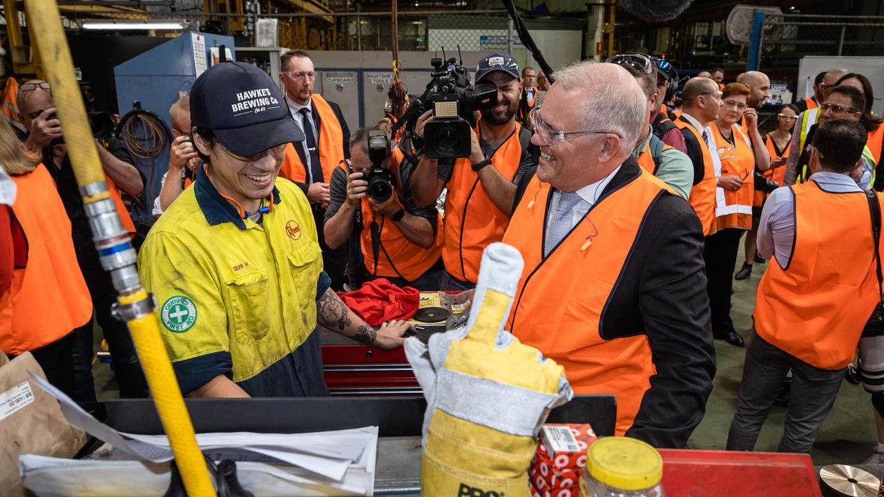 Scott Morrison gets the rude finger from a glove in the Rheem complex. Picture: Jason Edwards