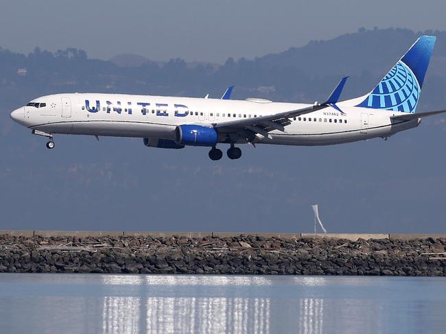 SAN FRANCISCO, CALIFORNIA - OCTOBER 19: A United Airlines plane lands at San Francisco International Airport on October 19, 2022 in San Francisco, California. United Airlines reported better than expected third quarter earnings with adjusted profit of $2.81 per share compared to analysts' expectations of $2.28.   Justin Sullivan/Getty Images/AFP
