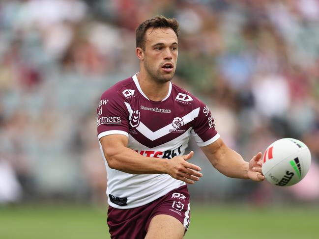 GOSFORD, AUSTRALIA - FEBRUARY 11:  Luke Brooks of the Sea Eagles passes during the NRL pre-season trial match between Manly Sea Eagles and South Sydney Rabbitohs at Industree Group Stadium on February 11, 2024 in Gosford, Australia. (Photo by Matt King/Getty Images)