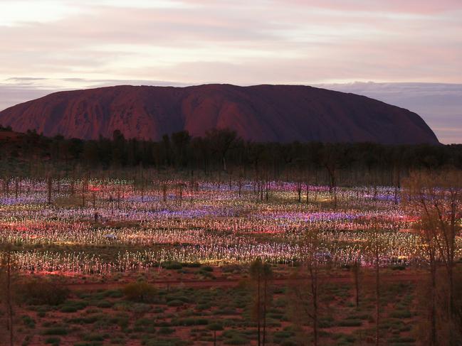 FIELD OF LIGHTAt this point, Bruce Munro’s vision of a colourful desert garden in full bloom almost needs no introduction. Some 50,000 frosted-glass spheres light up the Central Australian night in a rainbow of colours in all directions. Picture: Mark Pickthall
