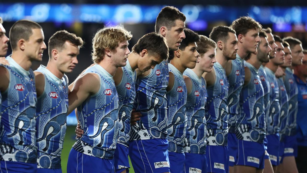 The Kangaroos line up ahead of the round 10 AFL match. Picture: Mike Owen