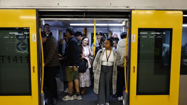 A full train on the T8 line on platform 23 at Central Station. Picture: Jonathan Ng