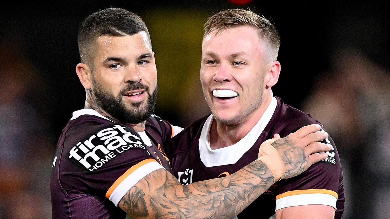 Adamn Reynolds and Billy Walters celebrate a try. Picture: Bradley Kanaris/Getty Images.