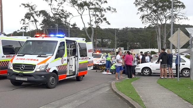 Emergency services at Parsons Road, Lisarow, where an 11-year-old boy was hit by a trail bike. Picture: David Cleverly.