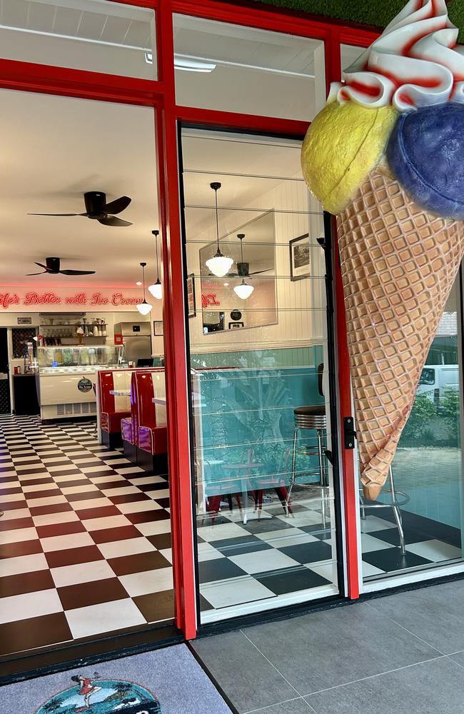 The giant ice cream outside The Scoop 4567 offers photo opportunities for passers-by.