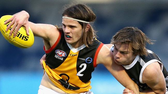 Dandenong Stingrays gun Hunter Clark is tackled during a TAC Cup match against the Greater Western Victoria Rebels in August. Picture: Robert Prezioso