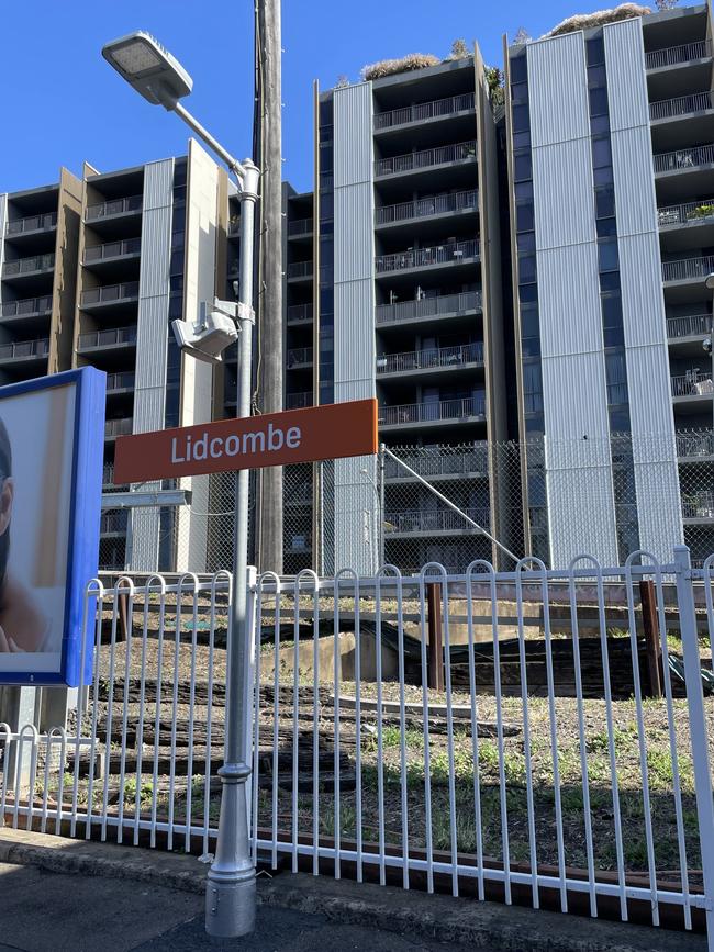 Thousands of commuters also surround Lidcombe train station.