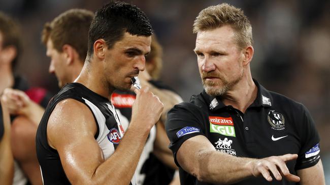 Scott Pendlebury and Nathan Buckley enjoyed one last game together as captain and coach on Monday against Melbourne, banking a famous victory. Picture: Dylan Burns/AFL Photos via Getty Images