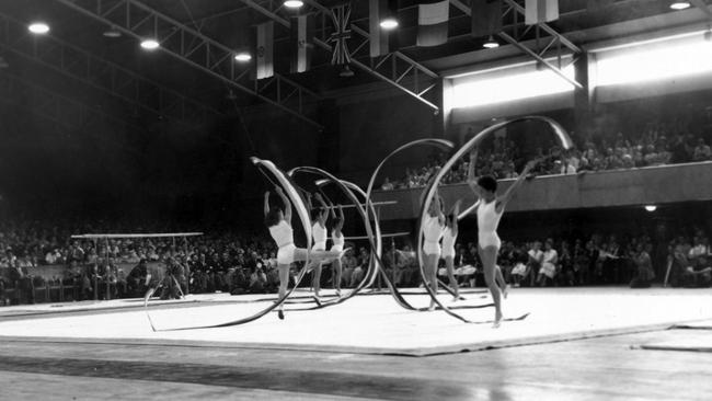 The Hungarian women's Gymnastic team in action at the West Melbourne stadium in 1956.