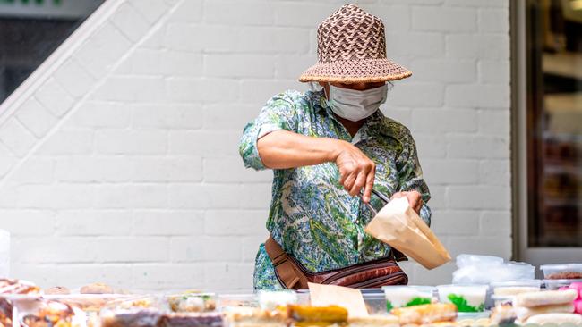 A stallholder at the Rapid Creek Markets on Sunday March 29. Picture: Che Chorley