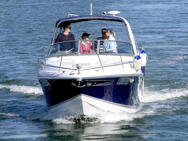 MANLY HARBOUR VILLAGE, QLD  ..  for David May story  ..   Small boats head out into Moreton Bay from Manly Boat Harbour. Picture: Â©Copyright David May.