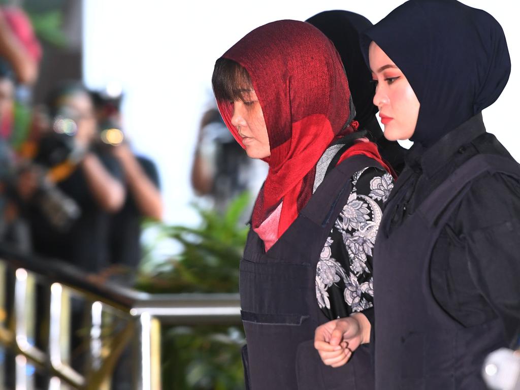Vietnamese national, Doan Thi Huong (2nd R) is escorted by Malaysian police at the Shah Alam High Court, outside Kuala Lumpur. Picture: AFP