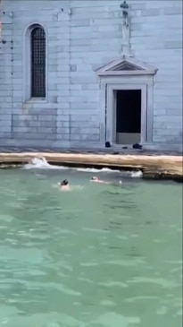 Tourists face bans from Venice after swimming in their murky lagoon