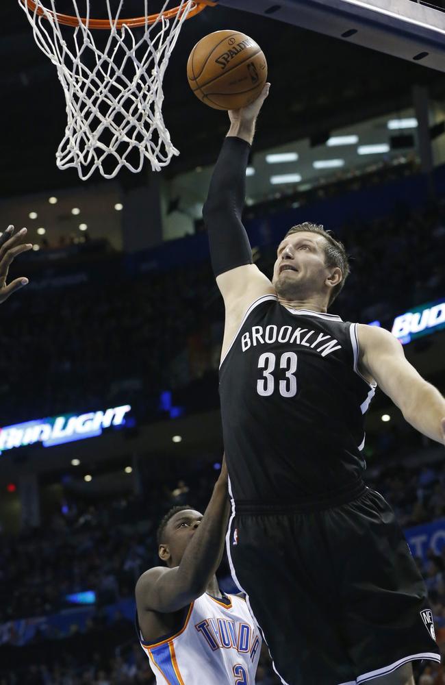 Brooklyn Nets' Mirza Teletovic (33) goes up for a dunk.