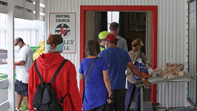 Queues for food are daily at The Uniting Church soup kitchen where a hot meals for the homeless and vulnerable are handed out. Picture: Toby Zerna