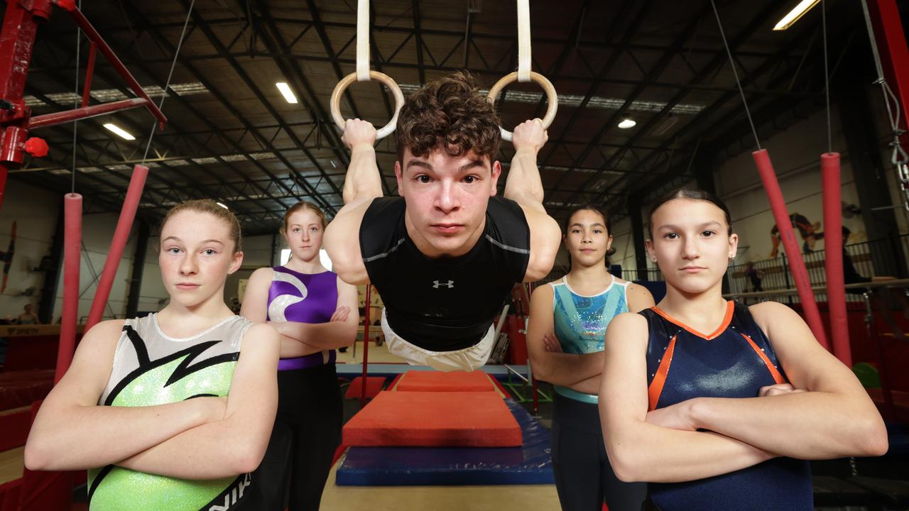 Pictured from left, Athleta Gymnastics gymnasts Chontelle Burgess, 13, Amber Duffy, 16, Ryan Voinescu, 17, Indiana Pham, 14, and Alyssa Rantino, 12, have had their hopes of representing Australia at the Games dashed by the announcement. Picture: David Caird