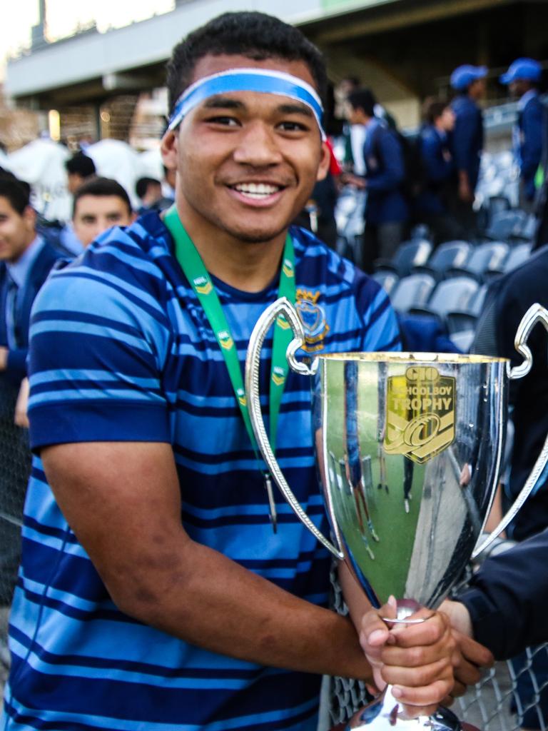 Skipper Sione Taufui with the trophy after Patrician Brothers' College Fairfield beat Mt Ridley College in the final of the NRL Schoolboys Trophy in 2017.