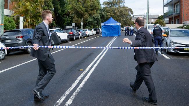 Detectives arrive at the scene. Picture: Max Mason-Hubers