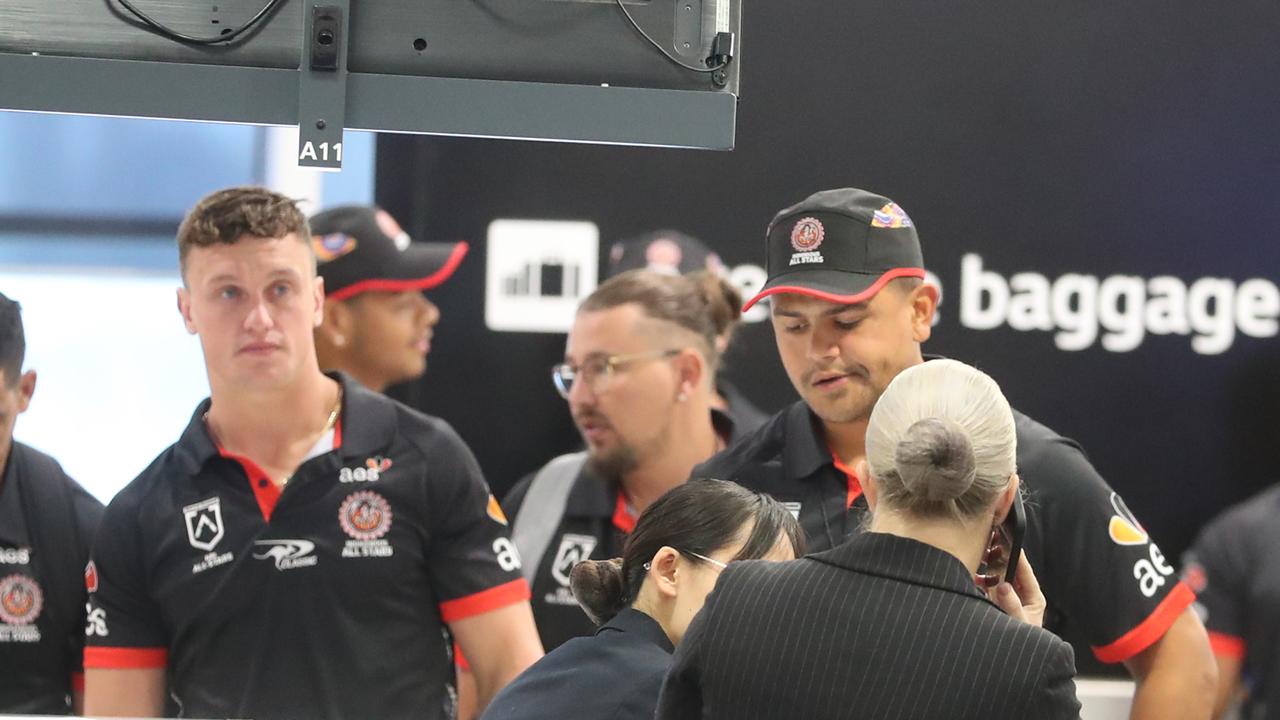 Latrell Mitchell and Jack Wighton at Sydney airport checking in before a flight only days after the pair were charged by police in Canberra. Picture John Grainger