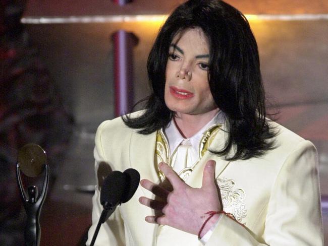 Michael Jackson is inducted into the Rock and Roll Hall of Fame in March 2001.