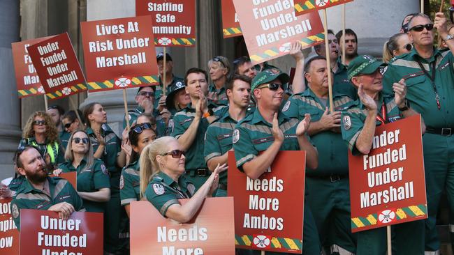 Ambulance officers warn of underfunding, on the steps of Parliament House. Picture: NCA NewsWire / Emma Brasier