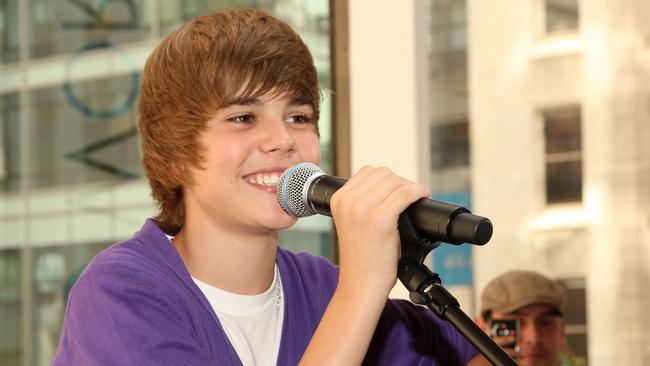 Bieber found it easier to muster a smile in 2009, when he played the Nintendo World Store. (Pic: Bryan Bedder/Getty Images)