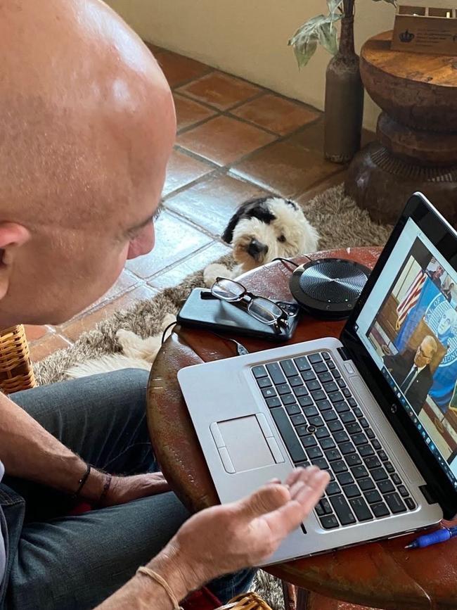 Amazon founder Jeff Bezos works with his dog Luna by his side. Picture: Instagram