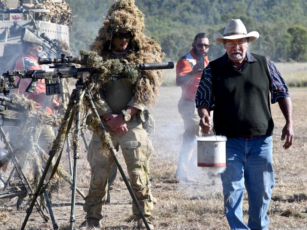 Darumbal Uncle Bill Mann performing a smoking ceremony for the beginning of Exercise Diamond Walk.