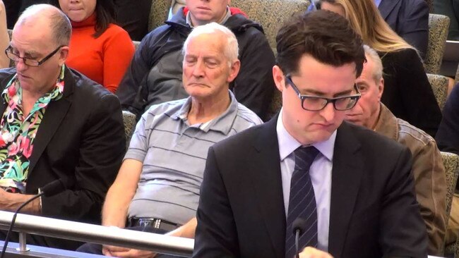 Michael Hodge QC is interrupted by his Apple Watch during the financial services royal commission.