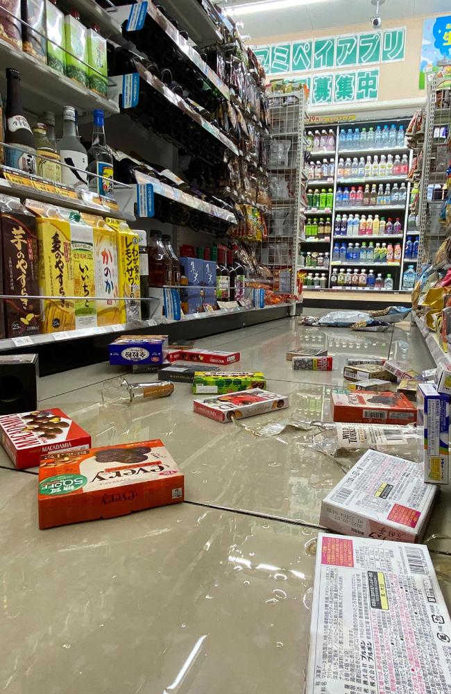 Items lay on the ground at a convenience store in Sendai, Miyagi prefecture on late March 16, 2022 after a 7.3-magnitude earthquake shook east Japan. Picture: AFP