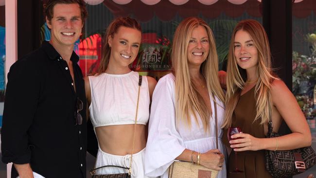 Josh Wallis, Ruby, Lucy and Nicky Brownless at the Piper-Heidsieck champagne terrace at Melbourne Park. Picture: Fiona Hamilton/Tennis Australia