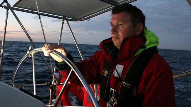 David Hows, 46, at the helm during the Sydney Gold Coast Yacht Race aboard Ocean Gem. Photo: Shaya Laughlin