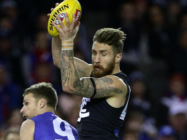 Zach Tuohy of Carlton marks during the Round 14 AFL match between the Western Bulldogs and the Carlton Blues played at Etihad Stadium on Saturday 4th July, 2015. Picture: Mark Dadswell
