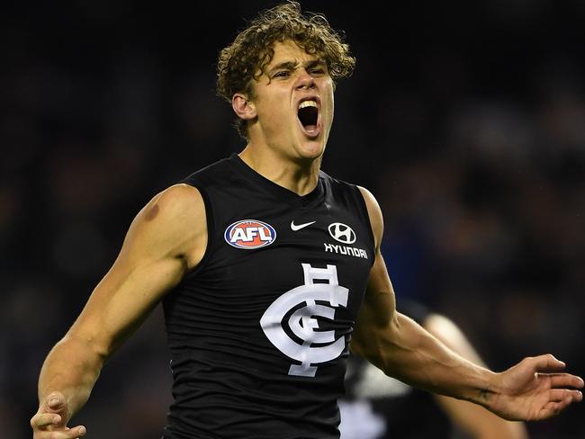 Charlie Curnow of the Blues reacts after kicking a goal during the Round 13 AFL match between the Carlton Blues and the Western Bulldogs at Marvel Stadium in Melbourne, Saturday, June 15, 2019.  (AAP Image/Julian Smith) NO ARCHIVING, EDITORIAL USE ONLY