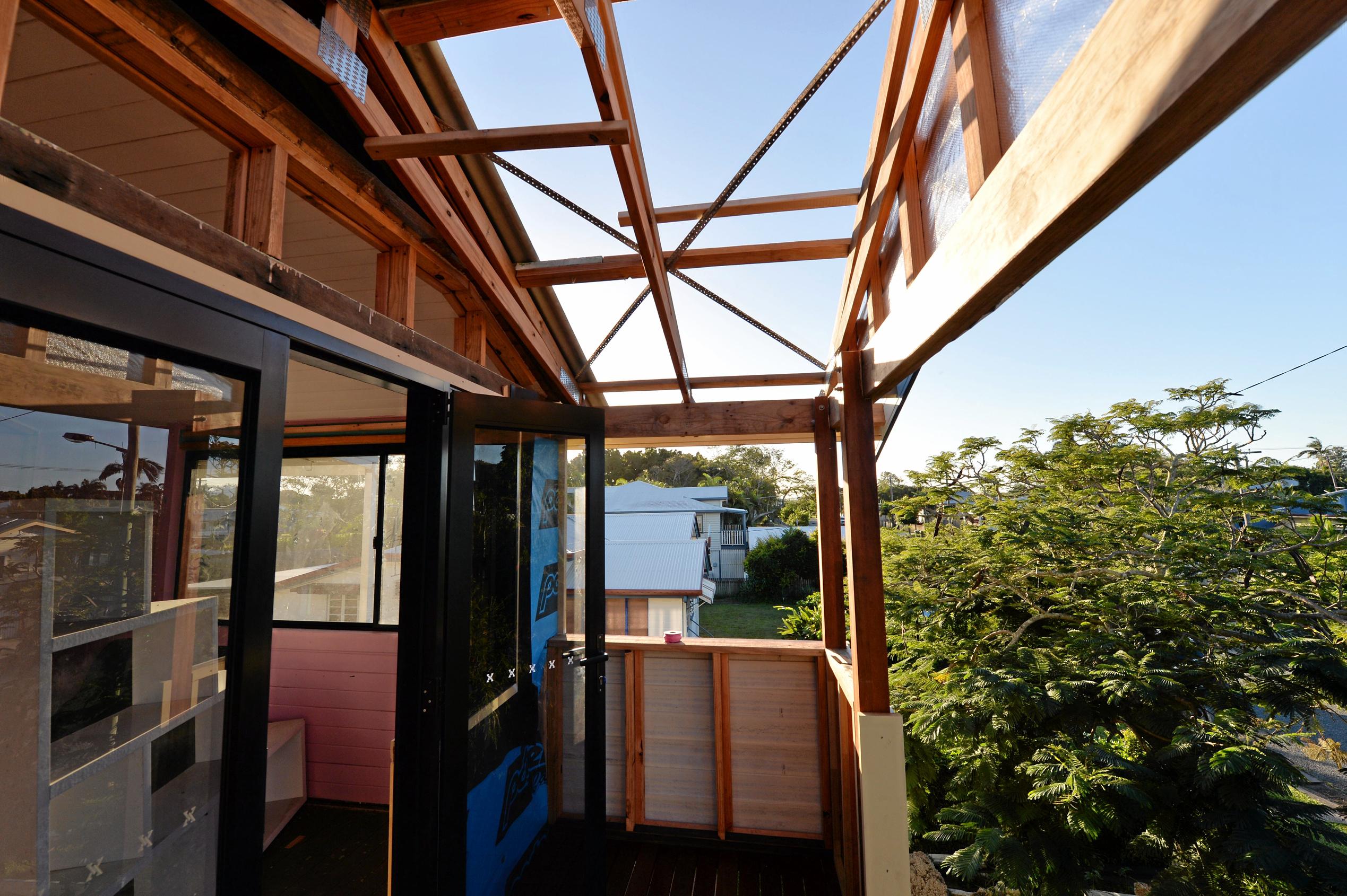 Mackay house-flippers Madison Strutynski and Michael Cotter at their Hunter St, West Mackay property. Picture: Stuart Quinn