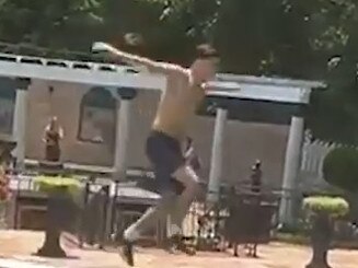 This is the shocking moment a Brit tourist jumped into Elvis Presley’s swimming pool at Graceland.