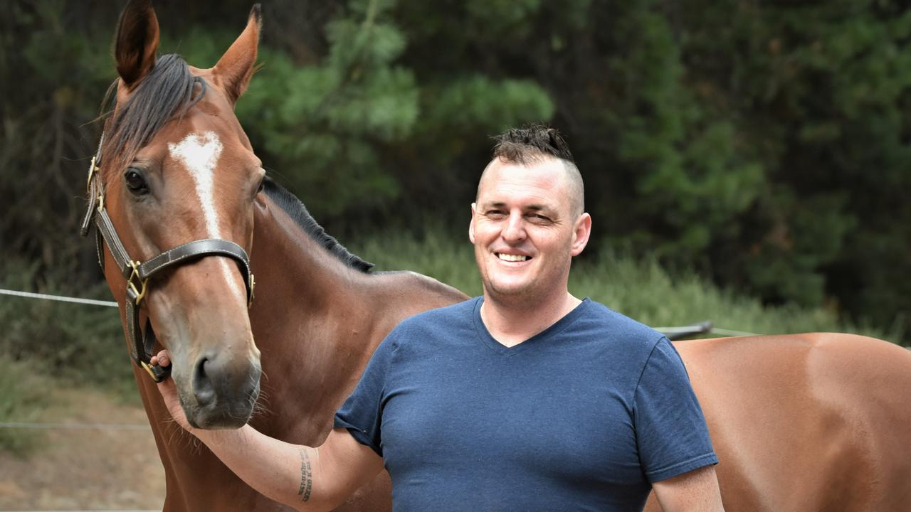 The Inevitable with trainer Scott Brunton at his Seven Mile Beach stables this week. Picture: Peter Staples