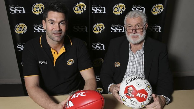 Former Ovens and Murray Football League general manager Sean Barrett (left) with ex-league chairman Graeme Patterson. Picture: Mark Jesser, The Border Mail