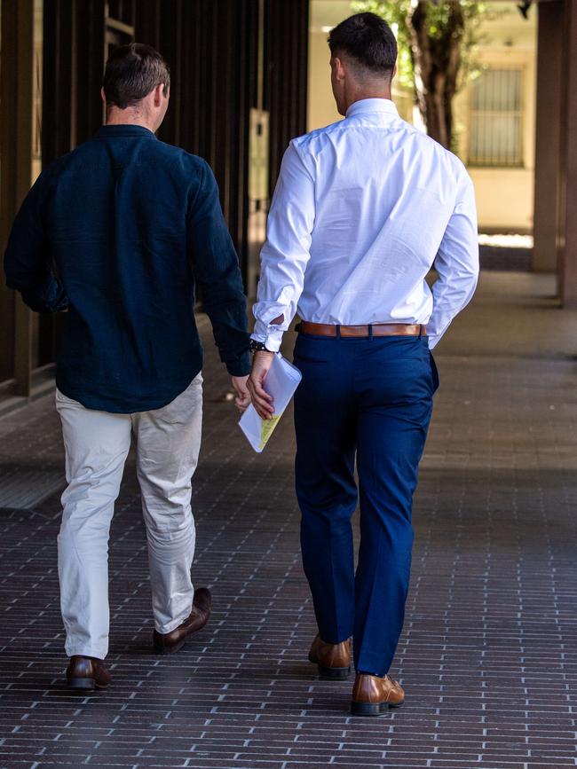 Jake Travis (right) leaves court. Picture: Monique Harmer